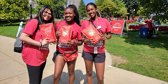 Three female students posing on the Welcome Week Picnic event